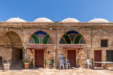 The courtyard of the Al Jazzar Mosque in Acre, Akko's old city on a sunny day.

