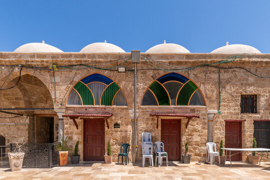 The courtyard of the Al Jazzar Mosque in Acre, Akko's old city on a sunny day.
