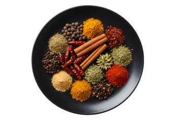 黒い皿に様々なスパイスとハーブが配置された美しい組成 料理や食材の背景に最適なカラフルなスパイスミックス