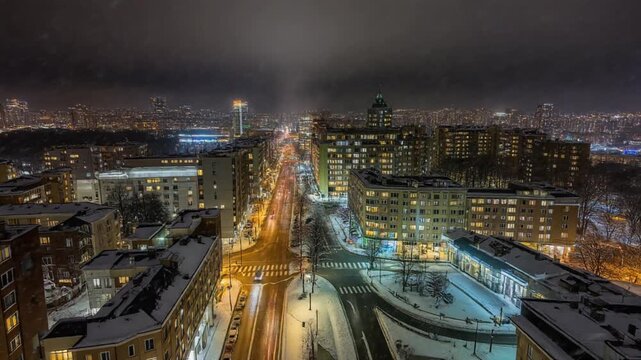 夜の雪降る大都市の夜景　タイムラプス風〜Night view of a snowy big city in time lapse style〜