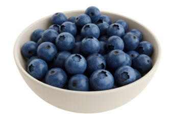 白いボウルに入った鮮やかな青色の熟したブルーベリーのクローズアップ 透明な背景の有機フルーツの食事