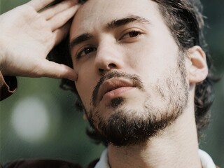 Close Up Portrait Of A Handsome Man With Beard Outdoor