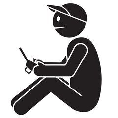 Black Silhouette of a Person Sitting and Operating a Remote Control Device © Zulfa