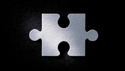 Single white puzzle piece on black backdrop