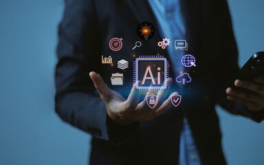 Business holding AI technology icons with glowing holographic interface,Concepts of artificial intelligence, big data innovation and digital virtual transformation machine learning