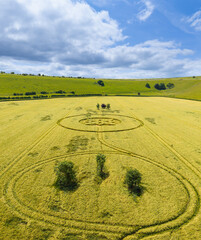 Aerial view of a mysterious, intricate, geometric crop art, crop circle formation in a barley field near Sutton Veny, Wiltshire, England, UK 