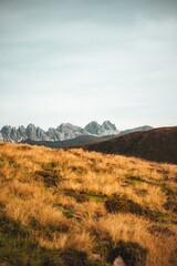 Majestic Mountain Range with Golden Grass