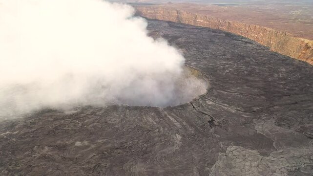 Erupting smoke at erta ale volcano in ethiopia captured from above