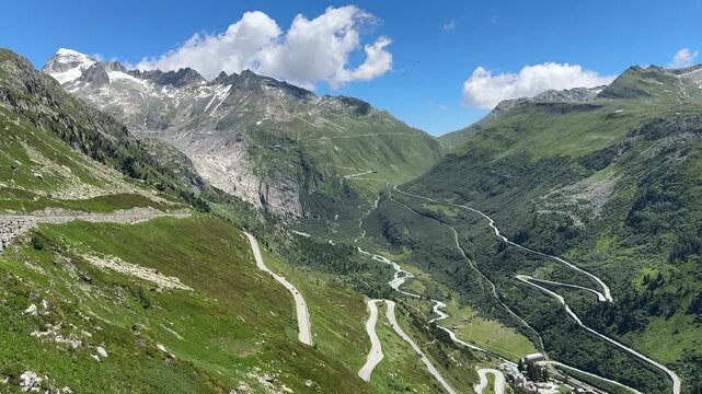 The beautiful winding road, Aerial view of the road to Furkapass in the Swiss Alps, Kanton Wallis , mountain road. The ice-free bed of the Rhone Glacier, Alpine panorama, Landscape of the Switzerland