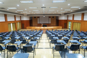 Empty Classroom with Desks and Chairs