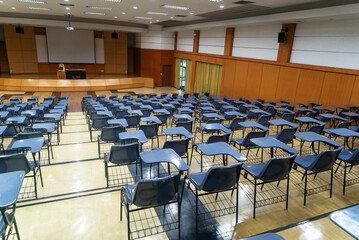 Empty Classroom with Desks and Chairs