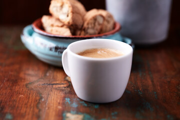 Cup of coffee on rustic wooden background. Soft focus. Copy space	