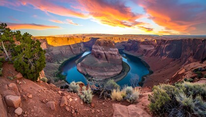 Grand Canyon vista at sunset. Dramatic colors, a river loop, and desert landscape