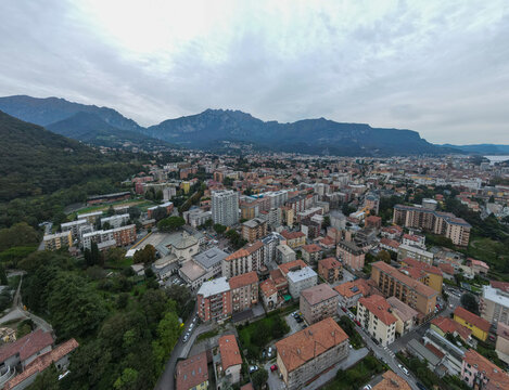 Aerial city landscape of Lecco village in Lake Como Italian Alps overcast fall day in Lombardy