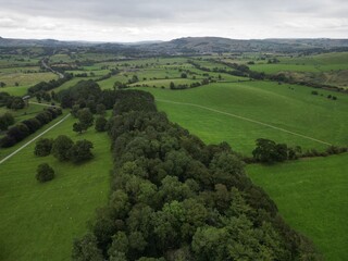 Aerial view of green fields and countryside in Skipton North Yorkshire England. 