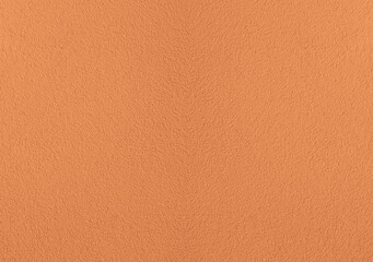 pink peach fuzz beige new modern concrete wall home house building exterior texture - close up banner format background with empty copy space for text. brown coral color texture pattern backdrop.