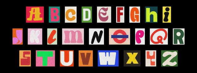 Creative scrapbook ransom alphabet collage with cut-out letters on black background