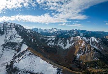 Aerial view of snow-capped mountain range.