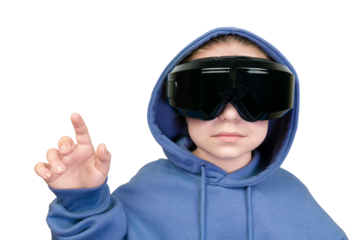 Child in blue hoodie and black virtual reality helmet touching virtual screen with finger on transparent background