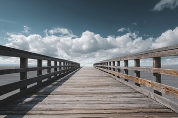 Obraz premium Wooden pier extending into a vast sky