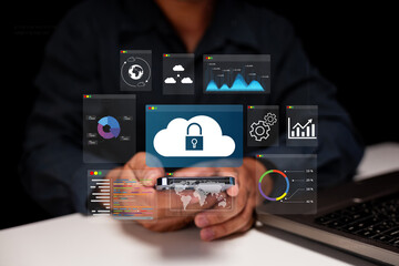 A person interacts with virtual data interfaces focused on cloud technology, analytics, and cybersecurity, showcasing a modern digital workspace.