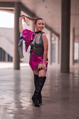 Obraz premium young girl in a bright pink suit in the style of modern and cyber punk