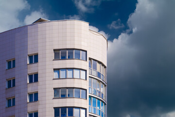 City view, modern buildings and skyscrapers against the blue sky.