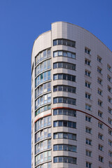 City view, modern buildings and skyscrapers against the blue sky.