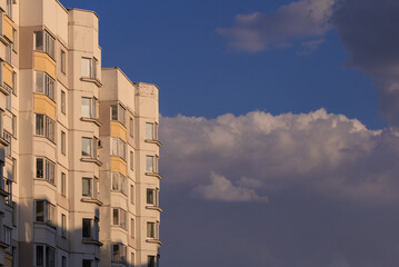 City view, modern buildings and skyscrapers against the blue sky.
