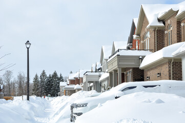 Snow covered houses in winter