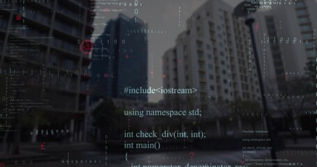 Projecting C++ code snippets onto modern towers in urban plaza, featuring street lamp and planters