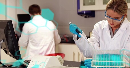 Pipetting scientist moving blue solution into test tubes in lab with gloves and goggles, copy space