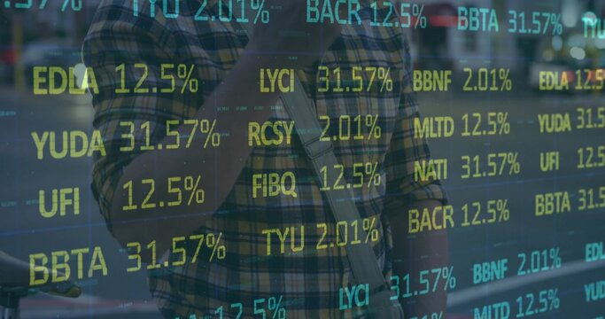 Standing man wearing plaid shirt holding smartphone at station with bike showing ticker symbols