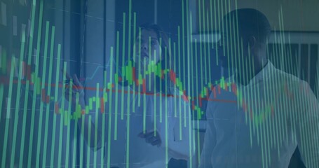 Gesturing strategist with marker and colleague discussing candlestick chart on glass wall in office