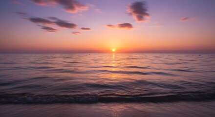 Obraz premium Sunset over calm ocean