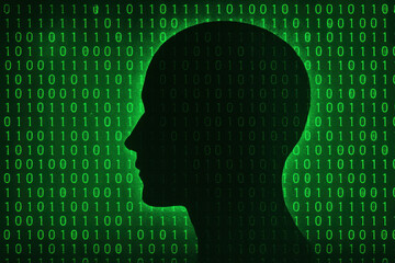 A Silhouette of a Head Against a Digital Backdrop of Green Binary Code, Representing the Intersection of Technology and Human Intelligence