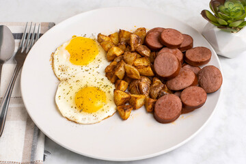  fried eggs with  kielbasa  and home fries