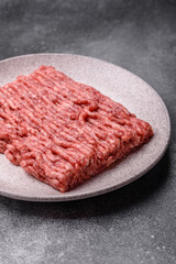 Raw ground beef or pork, fresh meat for burgers or other dishes. Raw beef minced meat