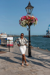 Poole Harbour Dorset England UK. 18.08.2025. Attractive tourist on the waterfront during a holiday in Dorset England UK.