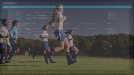 Female soccer players receiving unseen cue, accelerating sprinting with scrolling tech code overlay - Powered by Adobe