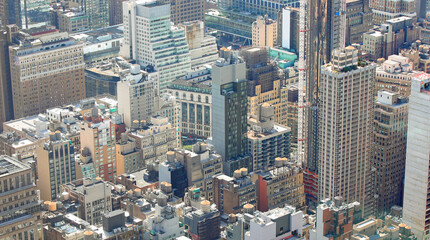 Urban agglomeration with many skyscrapers and modern buildings seen from a high angle in New York