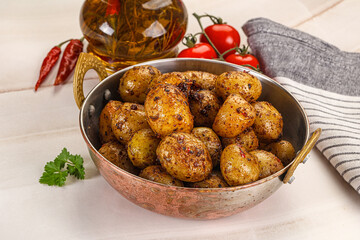 Baked mini potato with herbs