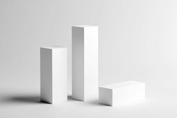 Three simple white rectangular forms on a plain white background