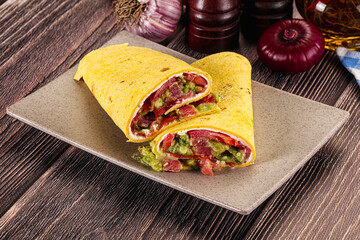 Burrito with tuna and vegetables wrap