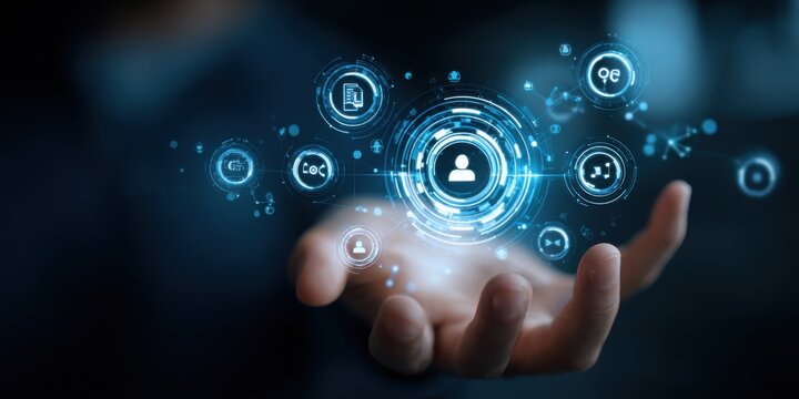 Hand holding a digital projection of interconnected data points and user icons