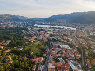 Fototapeta premium Aerial landscape of Lecco Maggianico Lago di Garlate Lake fall Italian Alps mountains Lombardy