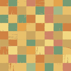Geometric pattern of muted squares with textured appearance. Abstract design with varied colors of orange, yellow, green and pink, creating a nostalgic aesthetic.