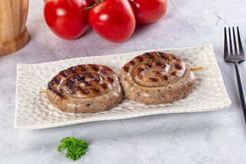 Grilled beef round circle sausages