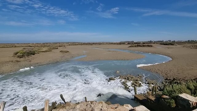 Water pipes in the Carboneros salt flats, Chiclana de la Frontera Natural Park, in the province of C&aacute;diz, Andalusia, Spain.
