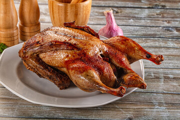 Baked with spices whole duck